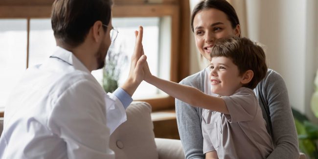 Happy little boy with mum giving high five to dad. Discussing future of superannuation